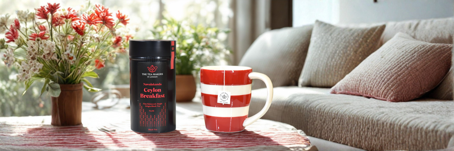 mug of ceylon breakfast tea in a living room with flowers on the table