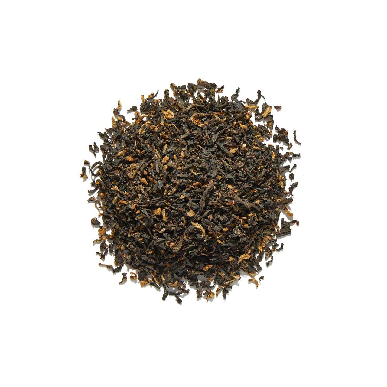 Assam Manjushree Loose Leaf Tea arranged in a circle