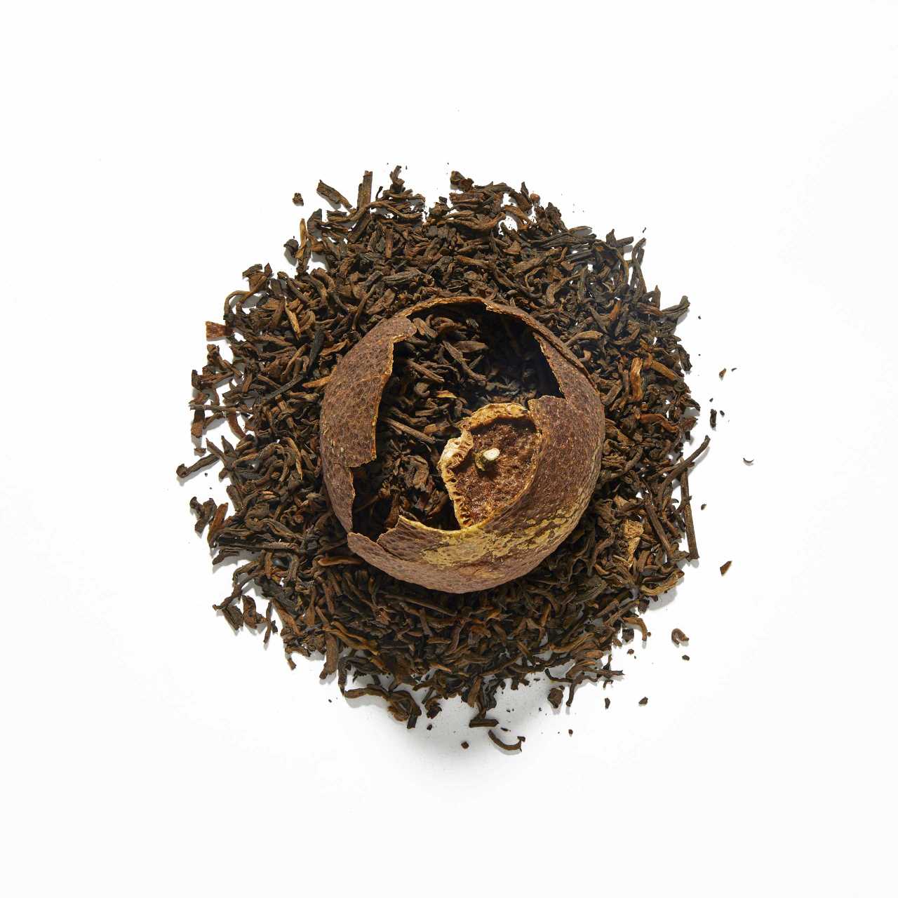 Tangerine Pu-Erh Loose Leaf Tea arranged in a circle