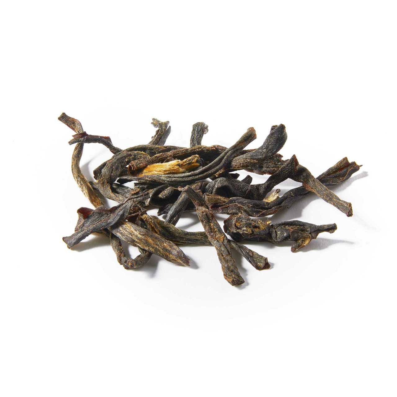 A macro pile of Assam Thowra Loose Leaf tea