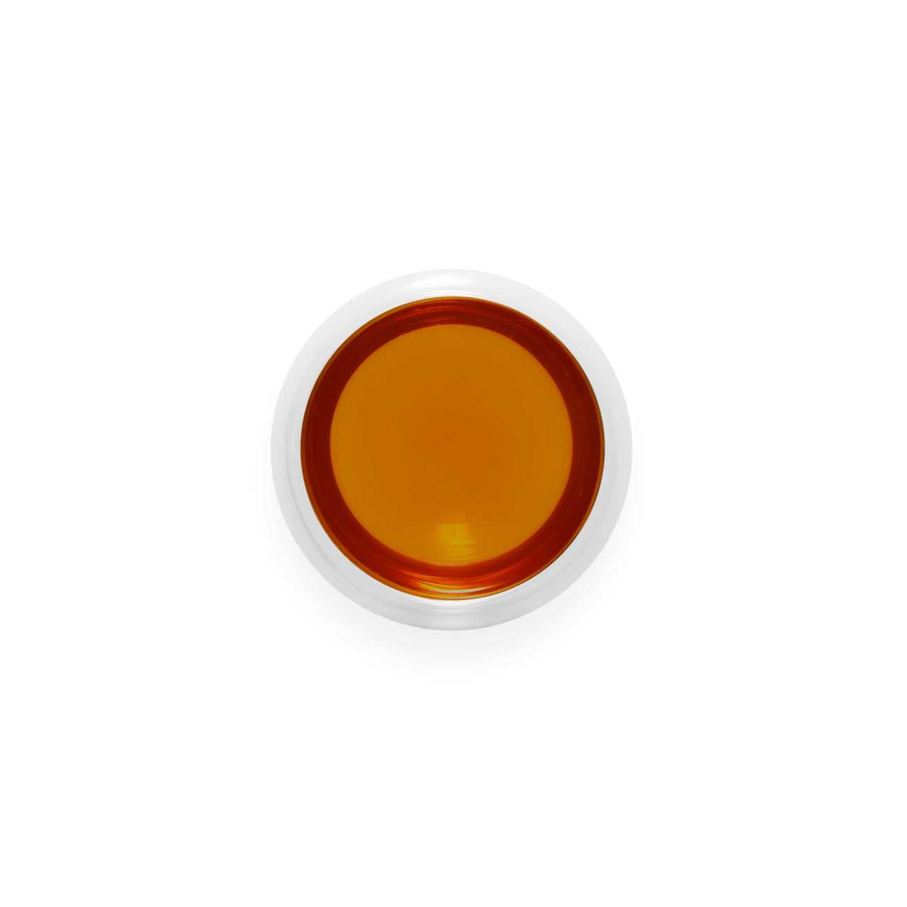 Imperial Aged Puerh tea infusion in a glass cup
