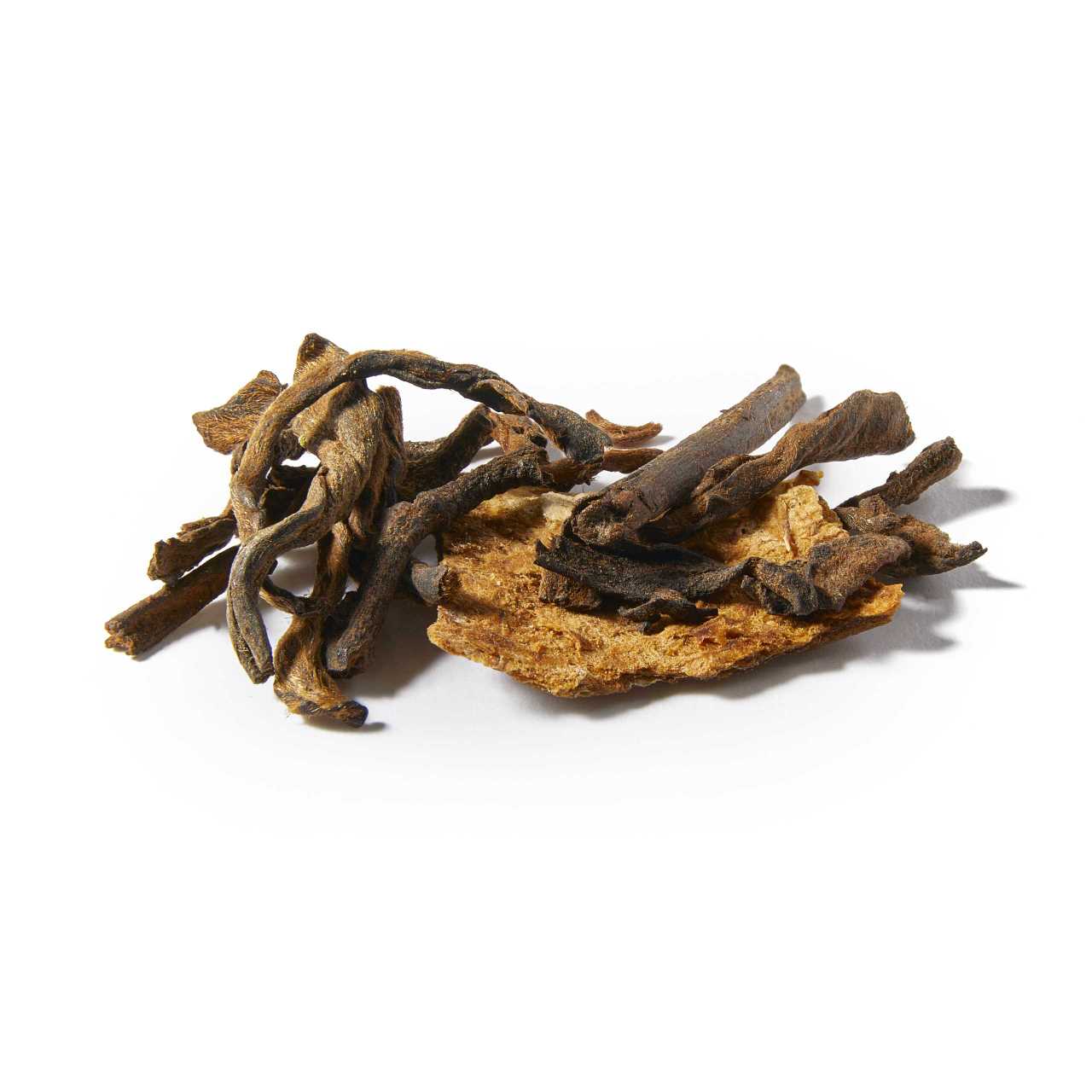 A macro pile of Tangerine Pu-Erh Loose Leaf Tea