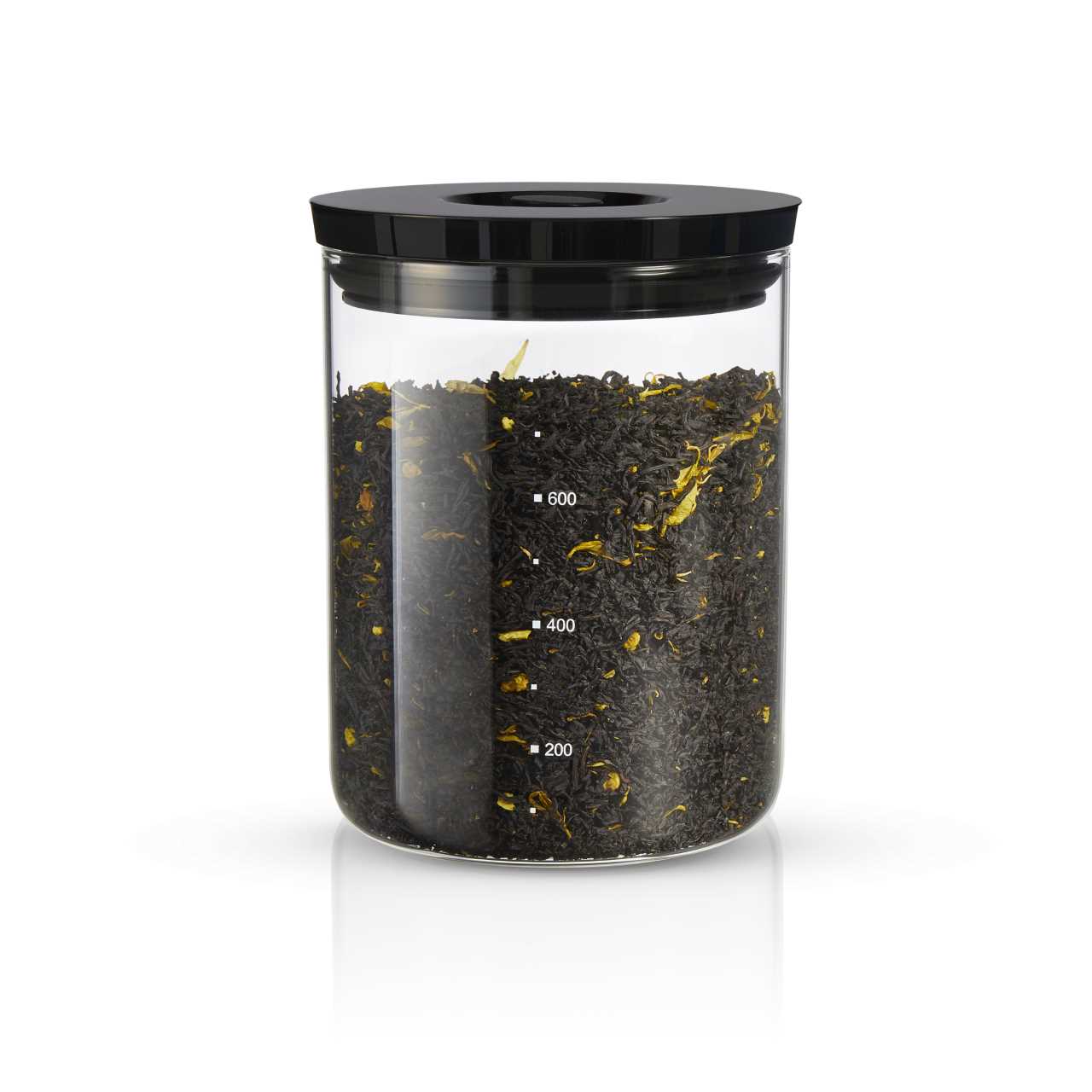 Air tight tea storage jar filled with black loose leaf tea