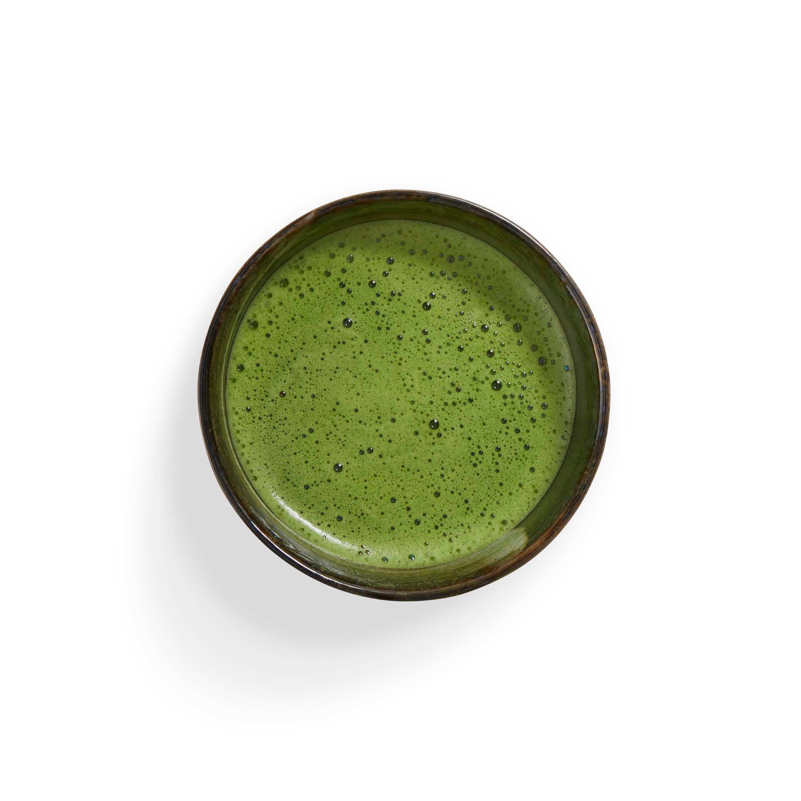 Handcrafted Japanese Ceramic Matcha Bowl with matcha brewed